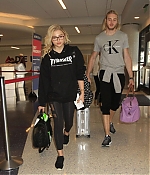 Chloe-Moretz-in-Tights-at-LAX-Airport--01-662x946.jpg