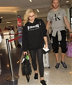 Chloe-Moretz-in-Tights-at-LAX-Airport--02-662x946.jpg