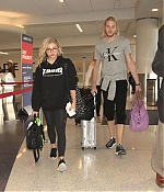 Chloe-Moretz-in-Tights-at-LAX-Airport--10-662x946.jpg